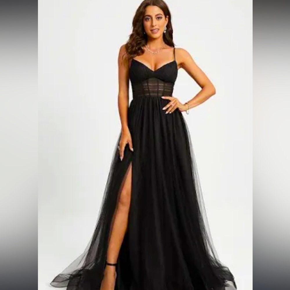 Size 8 black prom dress with a train and adjustable straps from JJshouse.